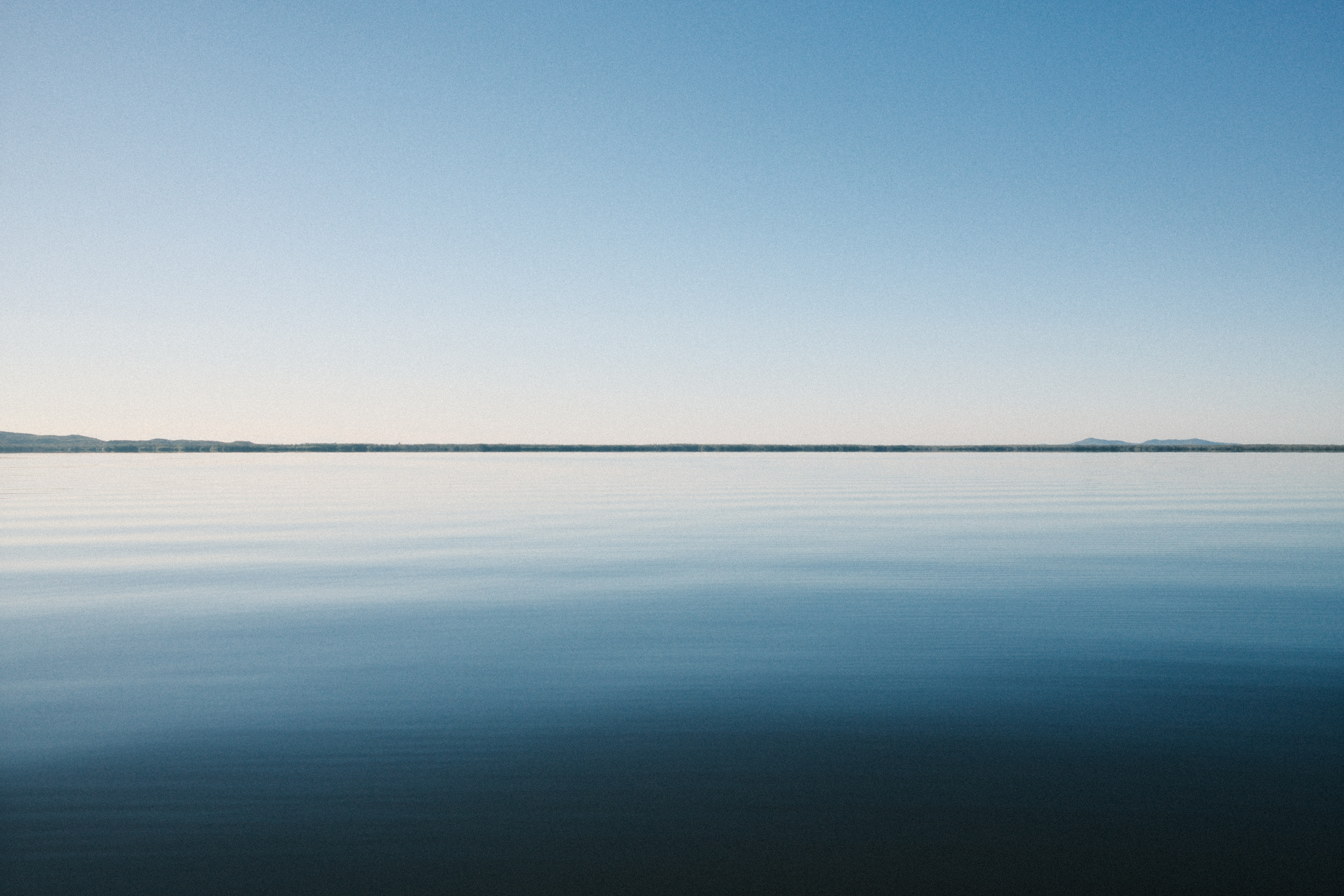 Still water and endless sky